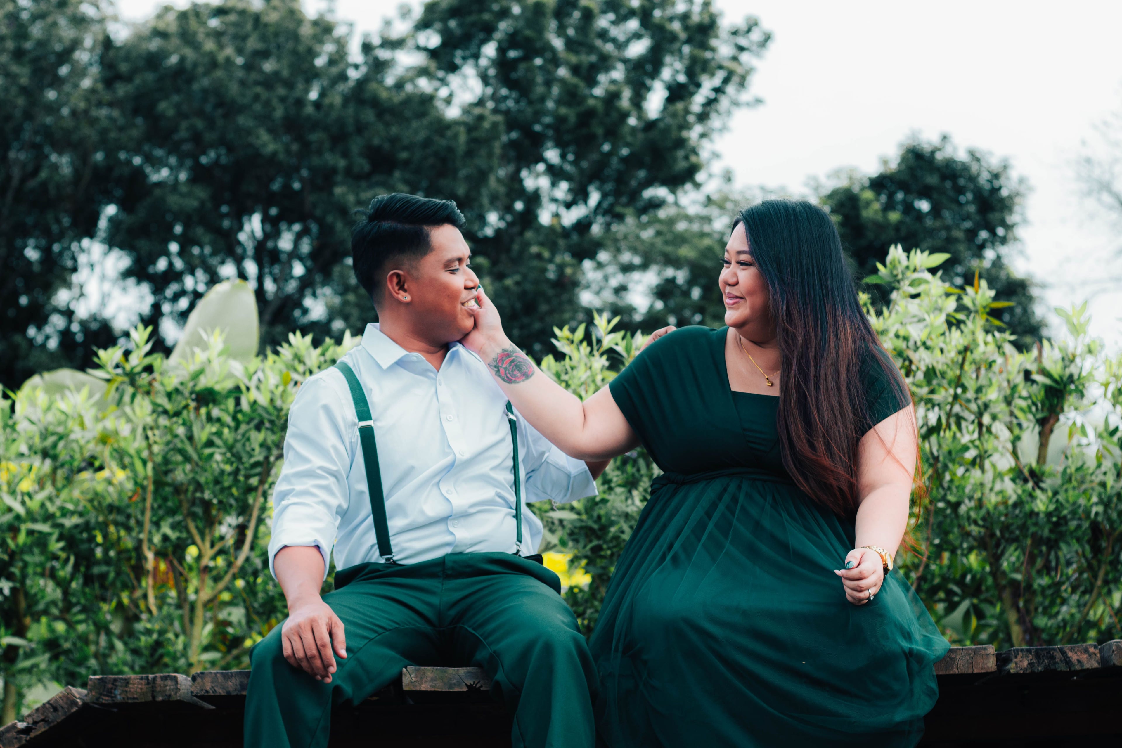 Anjo and Jasmin sharing a playful moment in the garden